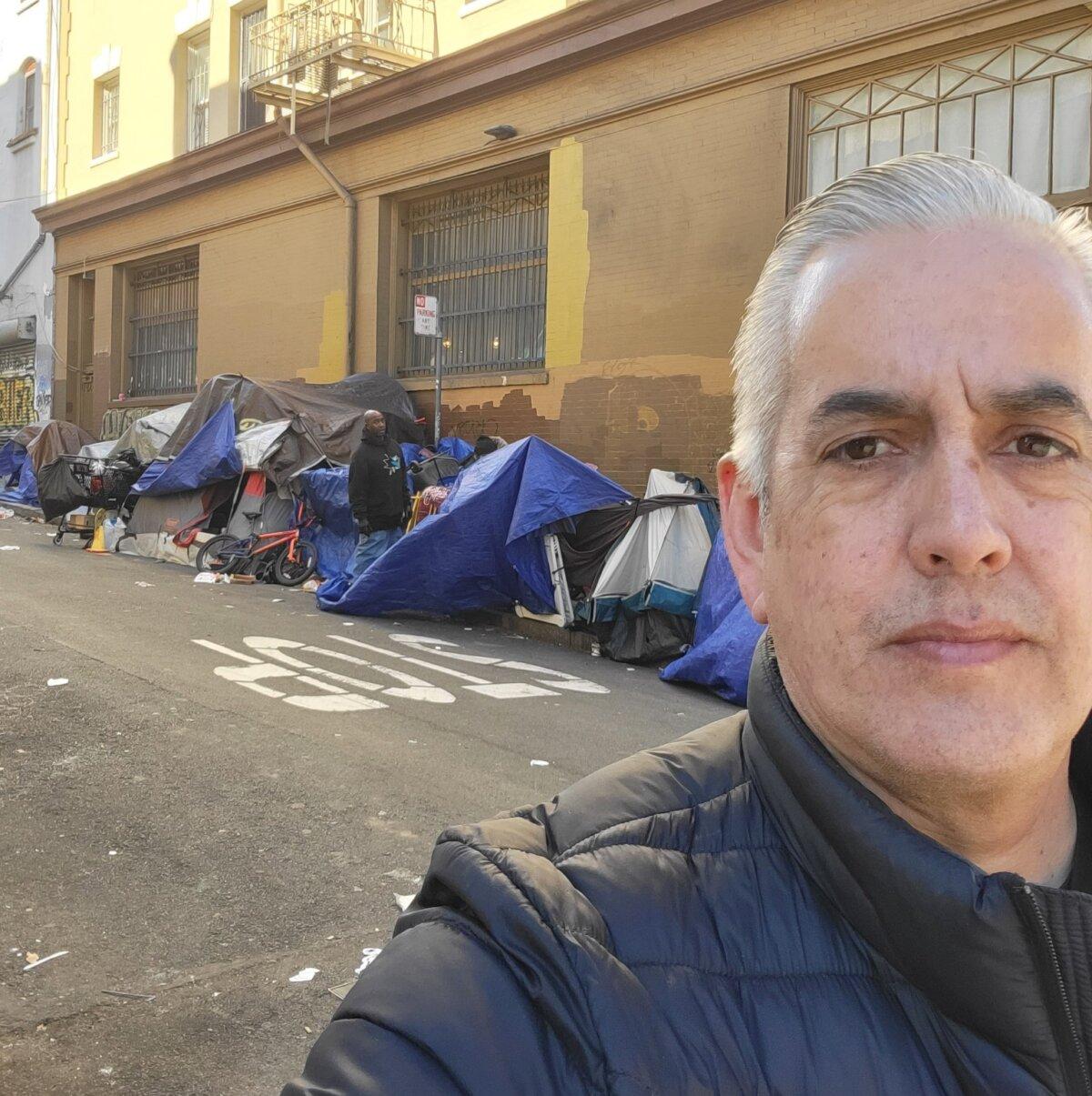 Tom Wolf, a recovery advocate, said he wants to shift the narrative away from "harm reduction" policies to support programs that fund and promote addiction recovery as a solution in the effort to reduce drug addiction and homelessness. Wolf is seen here walking San Francisco’s Tenderloin district in October 2023. (Courtesy of Tom Wolf)