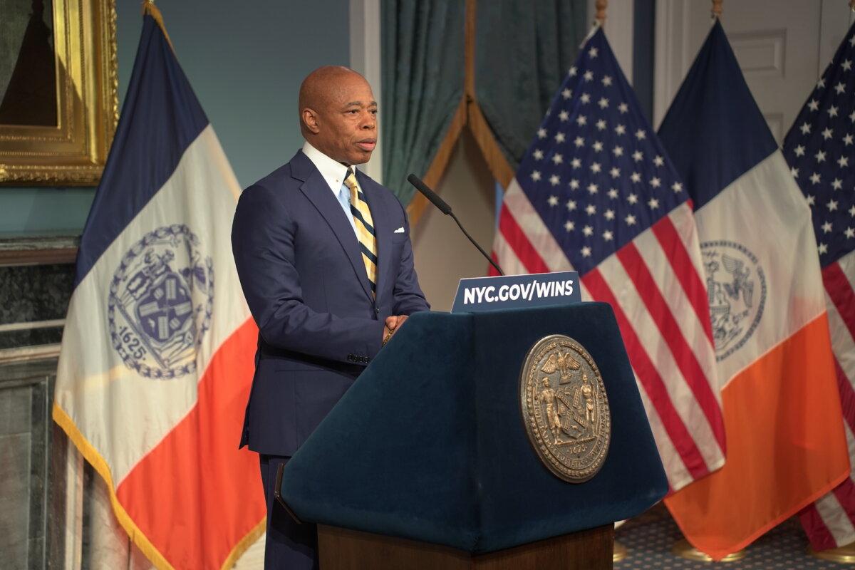 New York City Mayor Eric Adams speaks at a media availability event after meeting with border czar Tom Homan in New York City on Dec. 12, 2024. (Oliver Mantyk/The Epoch Times)