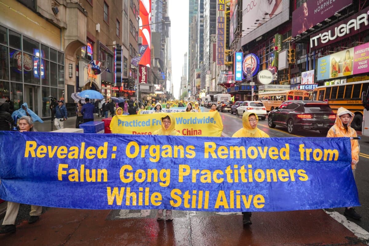 Falun Gong practitioners take part in a parade to celebrate World Falun Dafa Day and call for an end to the persecution in China, in New York City on May 10, 2024. (Samira Bouaou/The Epoch Times)
