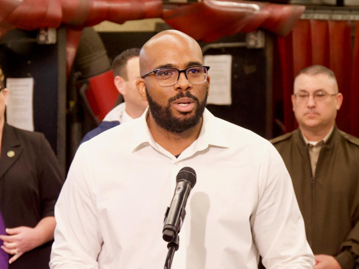 Billy Miller, dean of extended education and North State Together at Shasta College, speaks at a press conference from the welding shop at the college in Redding, Calif., on Dec. 16, 2024. (Travis Gillmore/The Epoch Times)