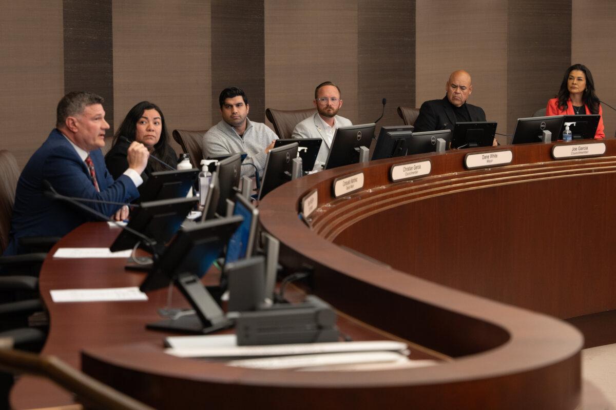 The City Council votes unanimously to declare a local emergency at the creek bed homeless encampment site, in Escondido, Calif., on Dec. 16, 2024. (L-R) City Manager Sean McGlynn, Councilmembers Consuelo Martinez and Christian Garcia, Mayor Dane White, and Councilmembers Joe Garcia and Judy Fitzgerald. (Jane Yang/The Epoch Times)