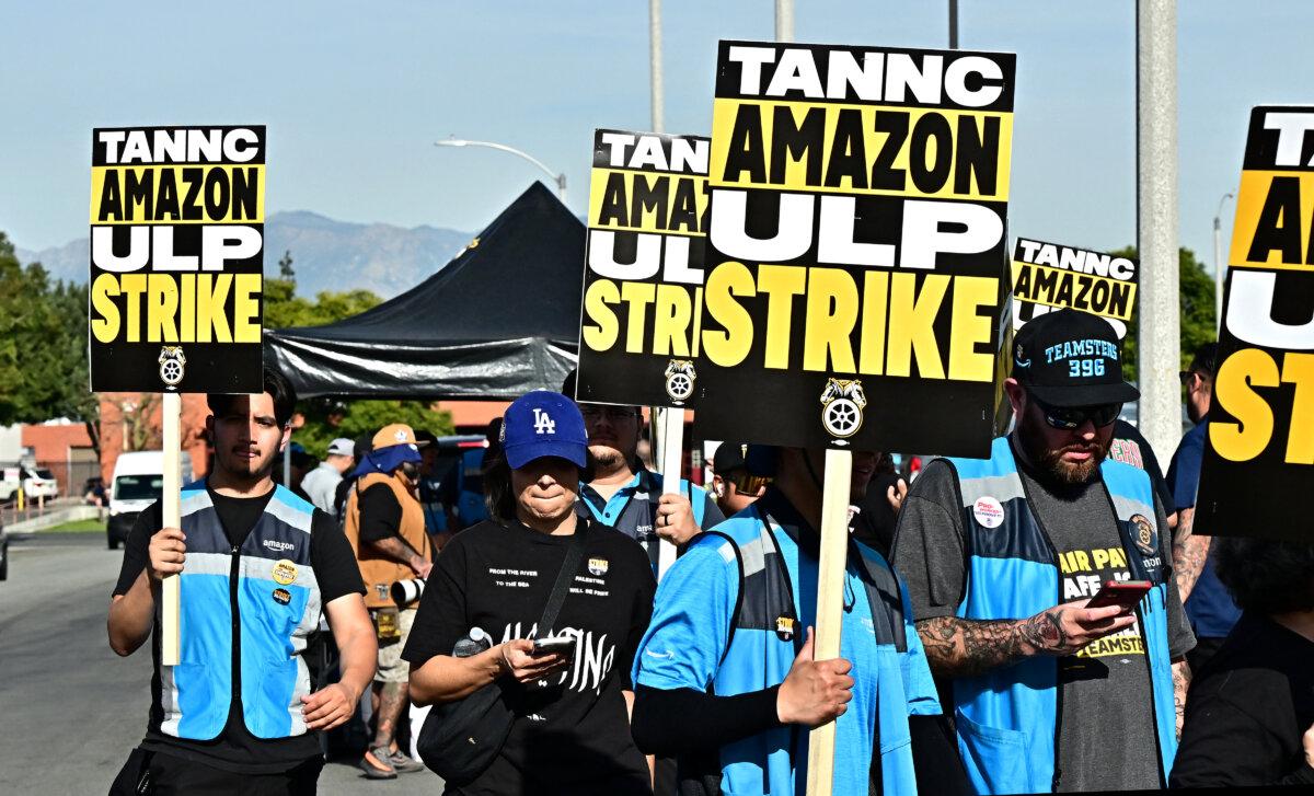 Amazon workers walk the picket line outside an Amazon facility in the City of Industry, Calif., on Dec. 19, 2024. (Frederic J. Brown/AFP via Getty Images)