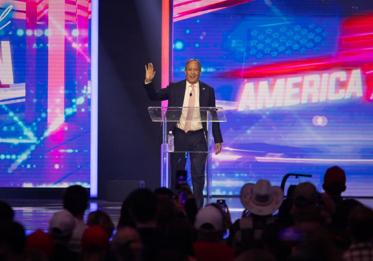 Texas Attorney General Ken Paxton speaks on Day 3 of the America Fest hosted by Turning Point USA in Phoenix on Dec. 21, 2024. (John Fredricks/The Epoch Times)