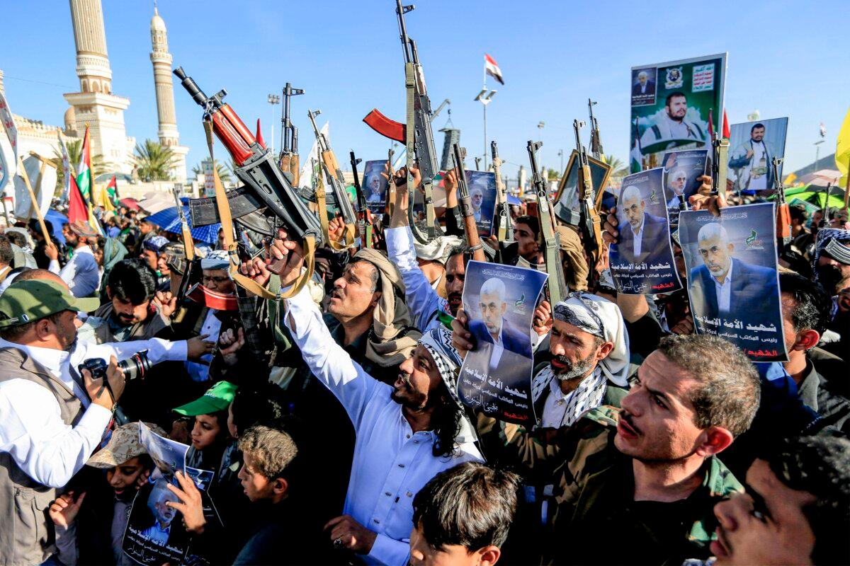 Supporters of Yemen's Huthis gather with pictures of Hamas's slain leader Yahya Sinwar in Sanaa in protest against Israel's attacks on Lebanon. (Mohammed Huwais/AFP via Getty Images)