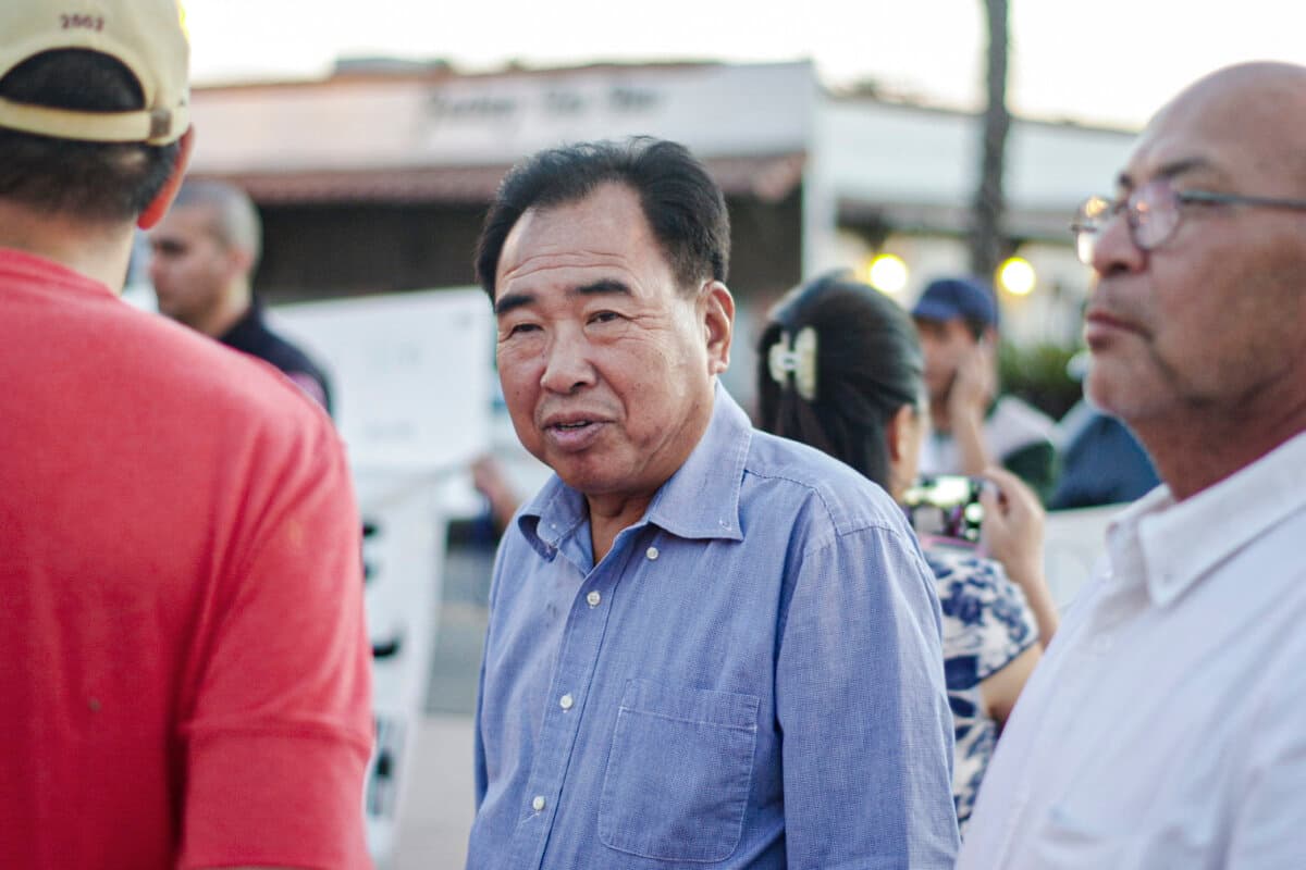 Chen Jun at a pro-Beijing event he organized at the San Gabriel Mission Playhouse in San Gabriel, Calif., in October 2016. Chen has pleaded guilty to acting as an illegal Chinese agent in a plot against the spiritual discipline Falun Gong. (Liu Fei/The Epoch Times)