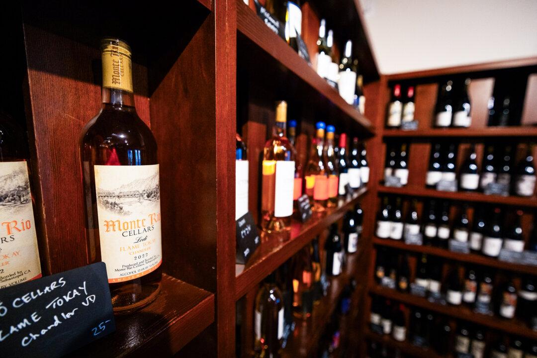 Bottles of wine sit on shelves ready for sale in Lodi, Calif., on Dec. 13, 2024. (John Fredricks/The Epoch Times)