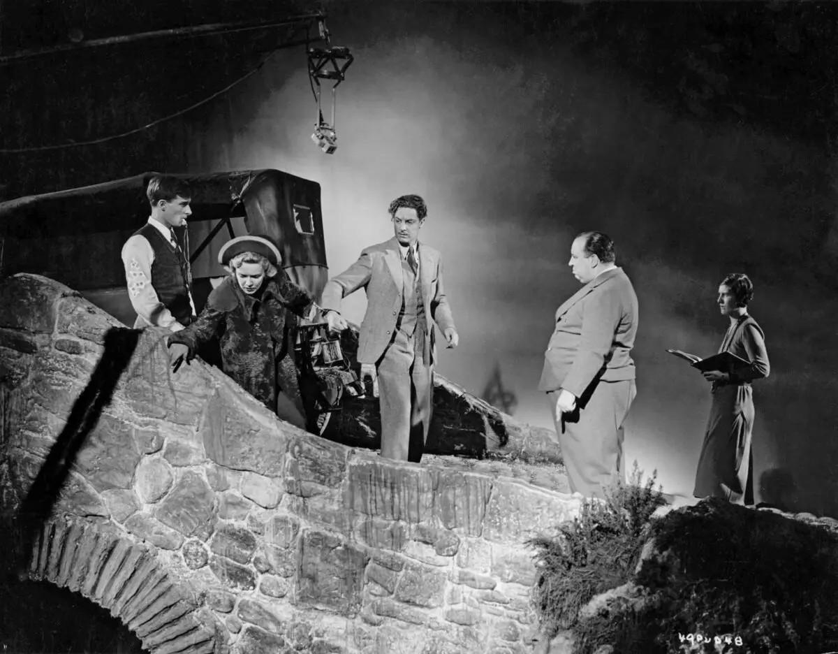 Behind the scenes of “The 39 Steps”: Center are (L–R) Madeleine Carroll, Robert Donat, and director Alfred Hitchcock. (Gaumont British Distributors)