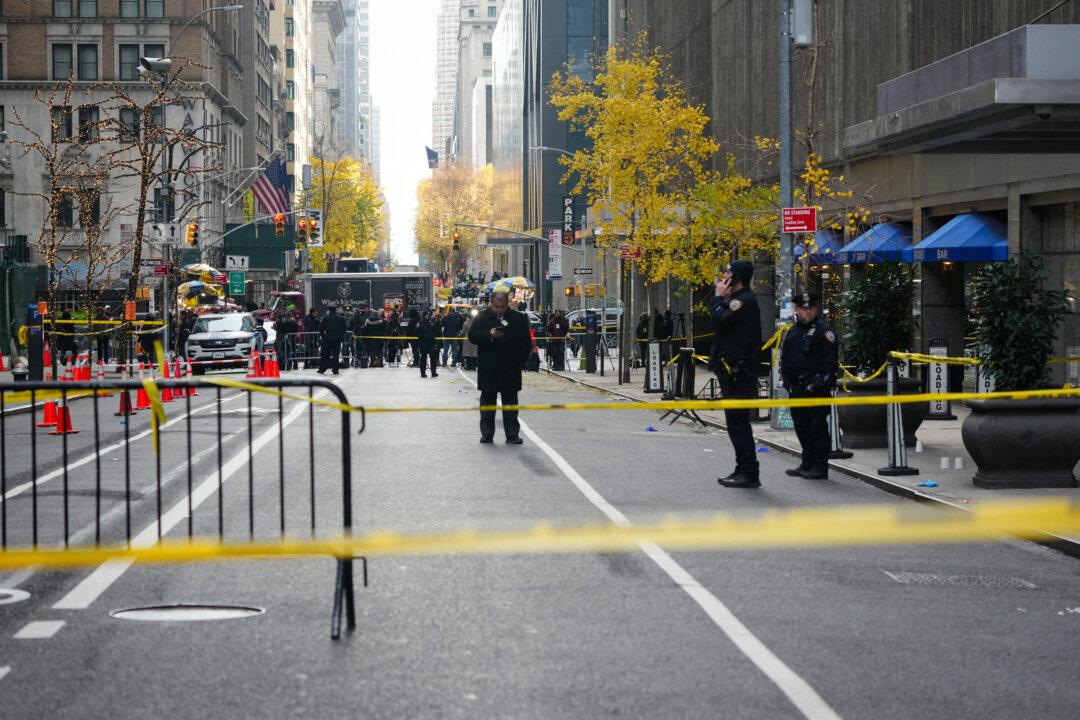 Police respond as CEO of UnitedHealthcare, Brian Thompson, was shot as he prepared to enter the New York Hilton in New York City on Dec. 4, 2024. (Bryan R. Smith/AFP via Getty Images)