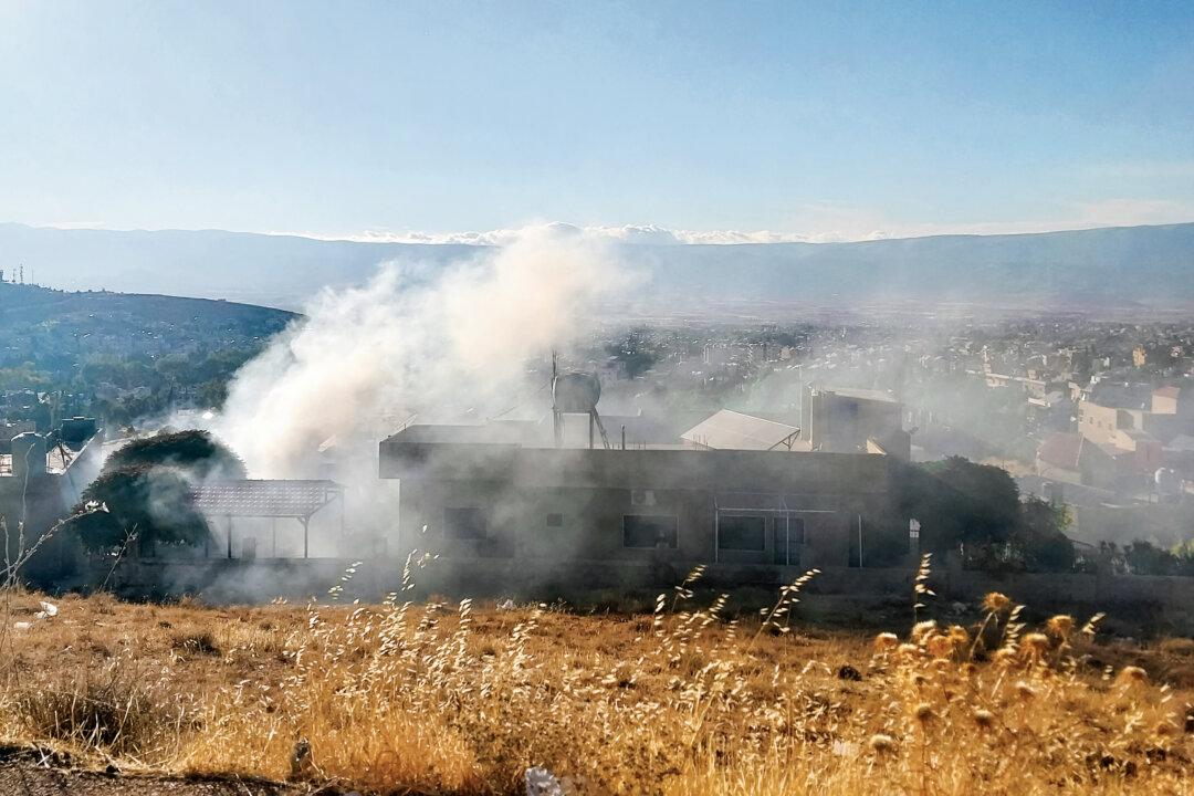 Smoke billows from a house after a reported explosion of a radio device, in Baalbek, Lebanon, on Sept. 18, 2024. (-/AFP via Getty Images)