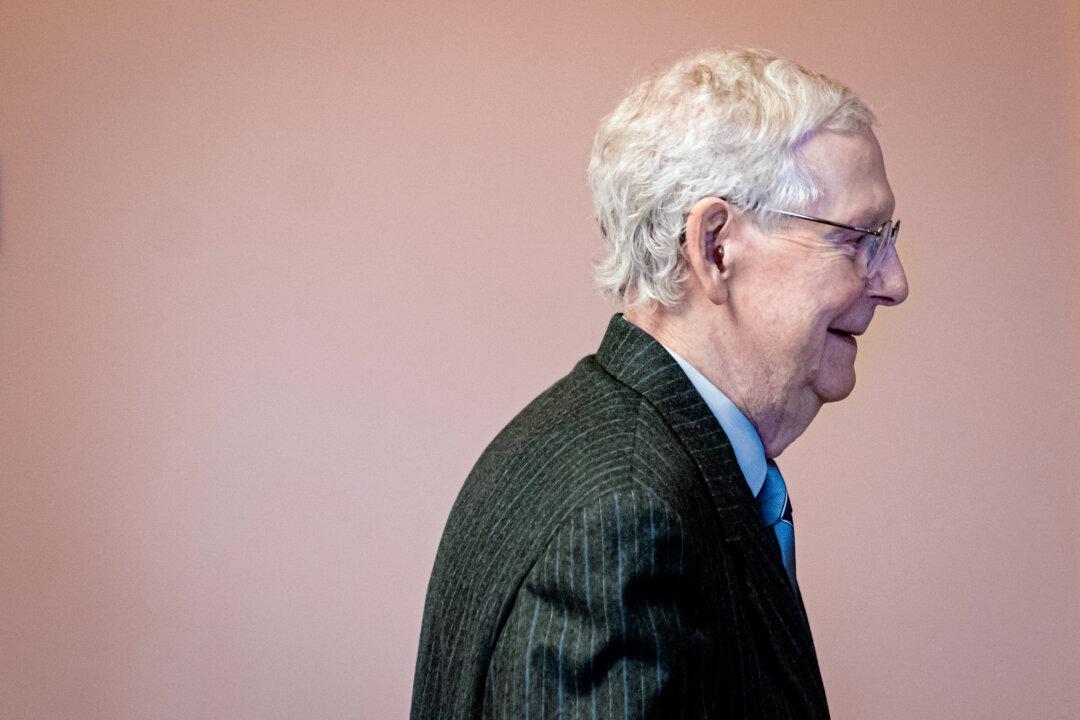 Senate Minority Leader Mitch McConnell (R-Ky.) walks toward his office in Washington on Feb. 28, 2024. McConnell announced on this day that he will step down as Republican leader in November. (Nathan Howard/Getty Images)