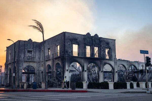 Homes and businesses sit damaged from the Palisades Fire burning near Los Angles, Calif., on Jan. 8, 2025. (John Fredricks/The Epoch Times)