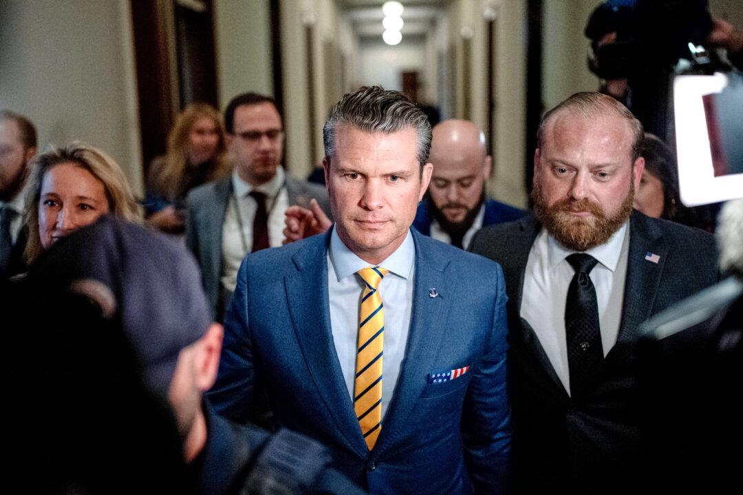 Pete Hegseth (C), President-elect Donald Trump's nominee for secretary of defense, walks through the Russell Senate Office Building on Capitol Hill on Dec. 3, 2024. (Andrew Harnik/Getty Images)