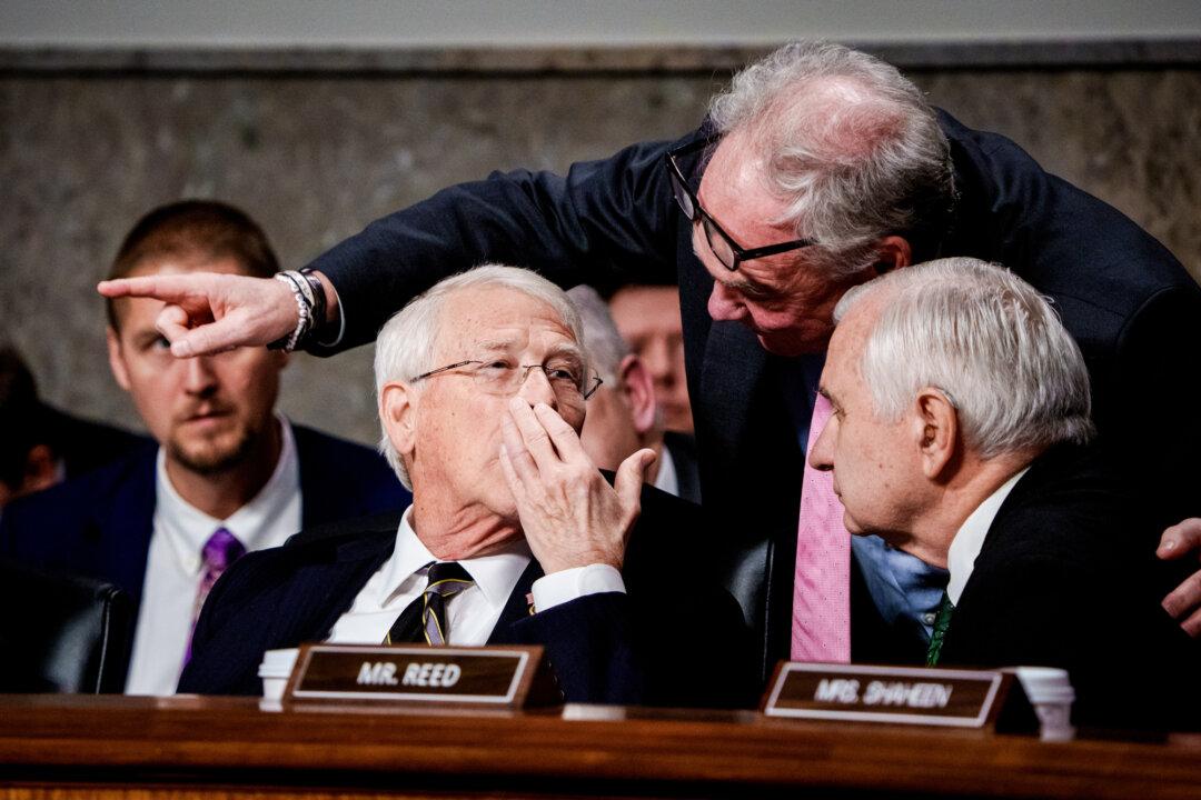 (L–R) Senate Armed Services Committee Chairman Sen. Roger Wicker (R-Miss.), Sen. Tim Kaine (D-Va.), and Ranking Member Sen. Jack Reed (D-R.I.) speak during a confirmation hearing for President-elect Donald Trump's nominee for Secretary of Defense, Pete Hegseth, at the U.S. Capitol on Jan. 14, 2025. (Andrew Harnik/Getty Images)
