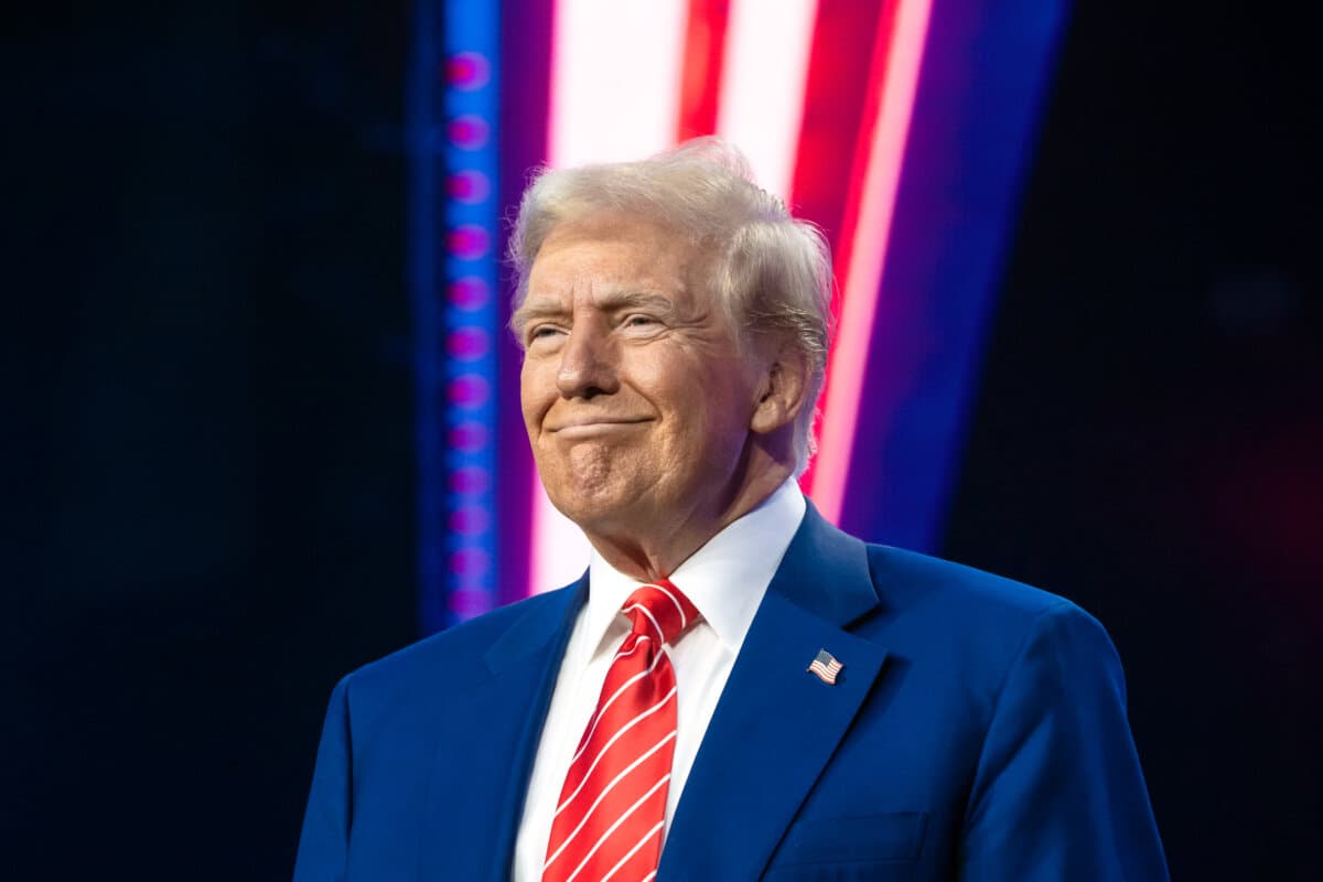 President-elect Donald Trump smiles during Turning Point USA's AmericaFest at the Phoenix Convention Center in Phoenix, Ariz., on Dec. 22, 2024. (Rebecca Noble/Getty Images)