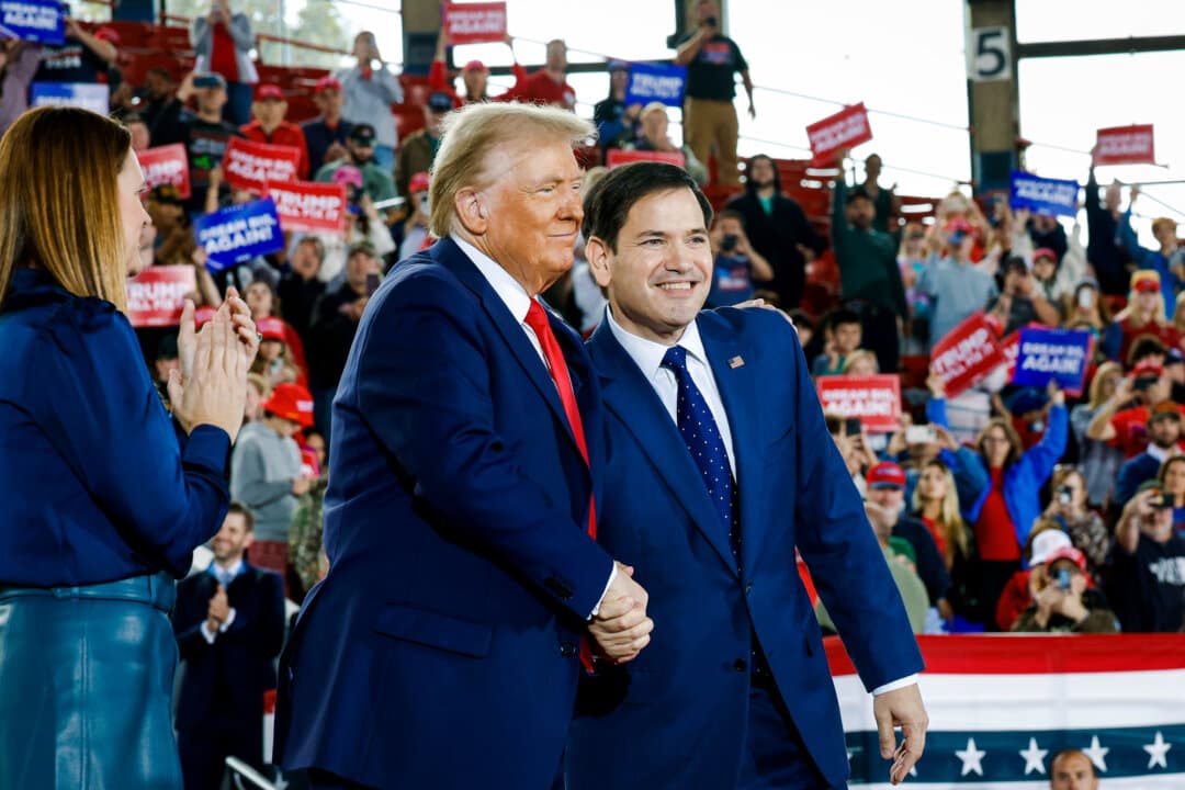 Former President Donald Trump appears onstage with Sen. Marco Rubio (R-Fla.) (R) and Arkansas Gov. Sarah Huckabee Sanders during a campaign rally in in Raleigh, N.C., on Nov. 4, 2024. (Chip Somodevilla/Getty Images)
