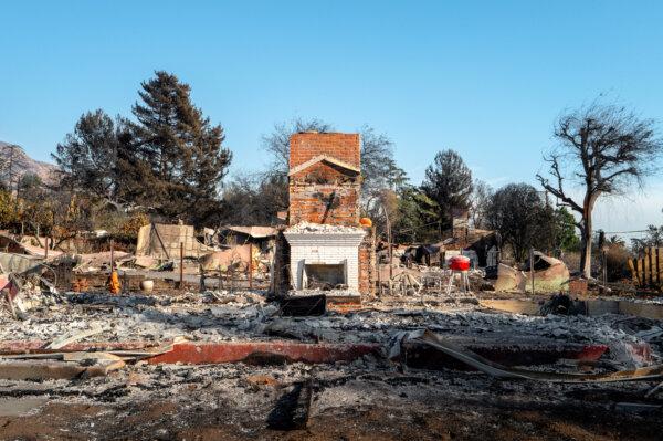 The fireplace and chimney of a home destroyed in the Eaton Fire in Altadena, Calif., on Jan. 16. (Brandon Bell/Getty Images)