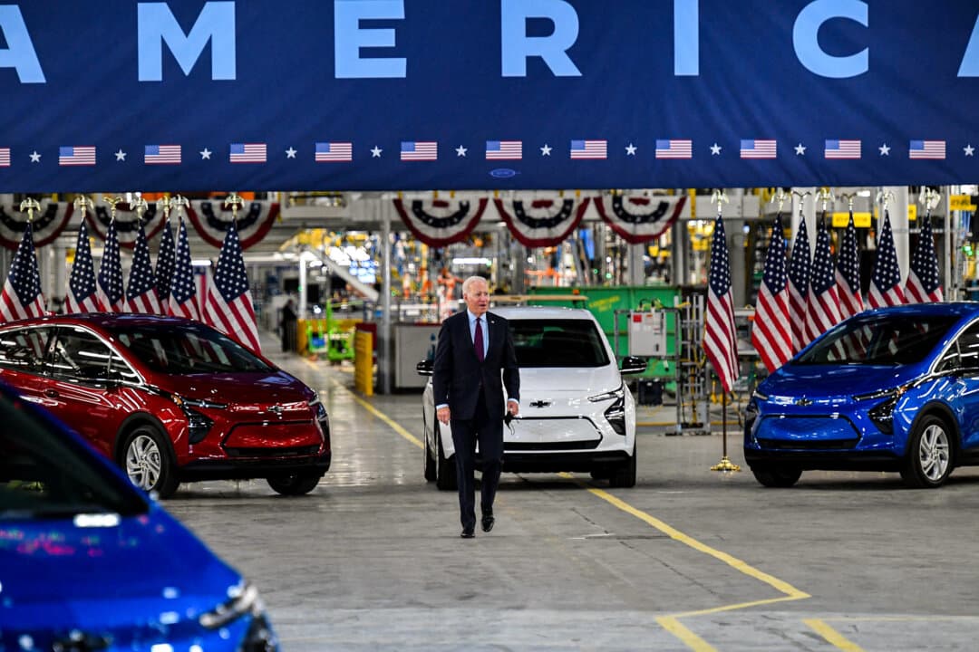 President Joe Biden walks near Chevy vehicles as he arrives to deliver remarks during a visit to the General Motors Factory ZERO electric vehicle assembly plant in Detroit on Nov. 17, 2021. (Mandel Ngan/AFP via Getty Images)