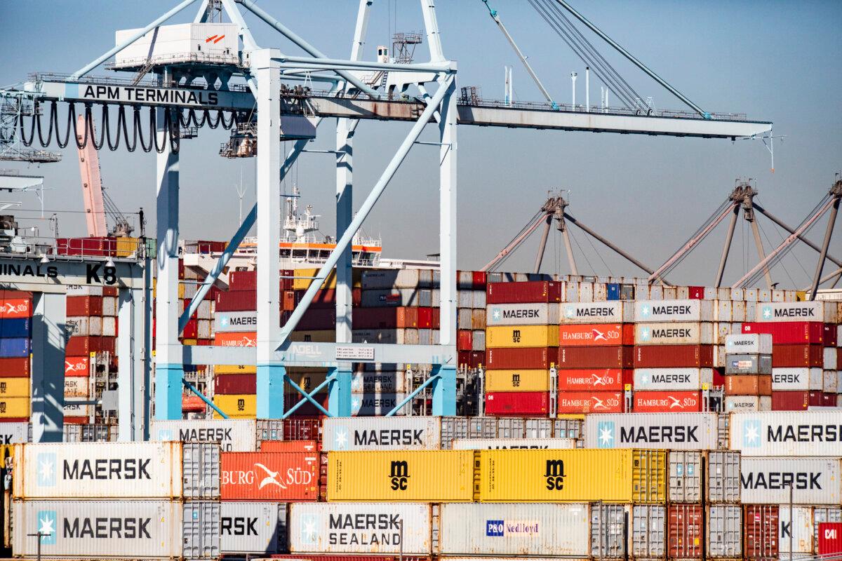 Shipping containers wait to be transferred from the ports of Los Angeles and Long Beach on Oct. 14, 2021. (John Fredricks/The Epoch Times)