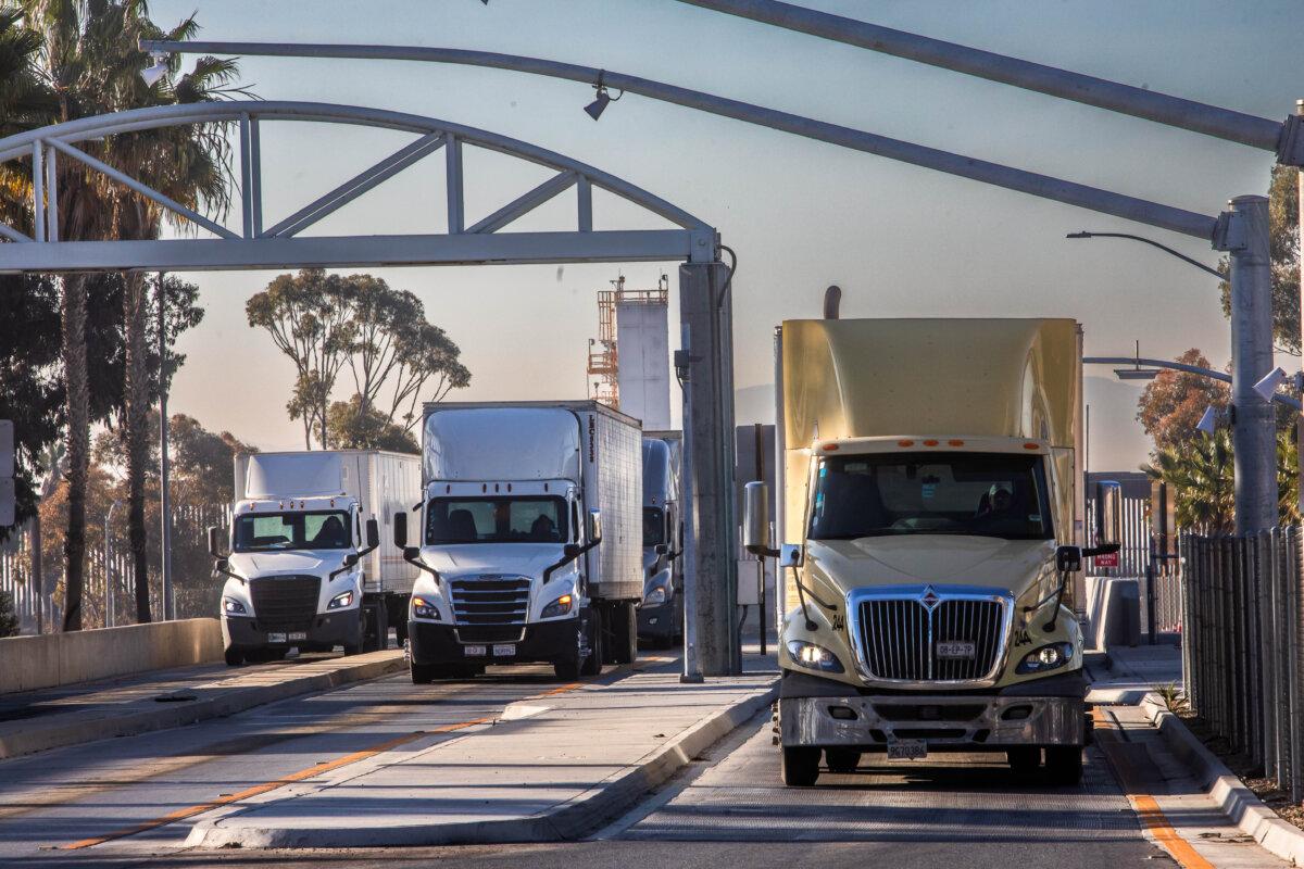 Drivers in trucks enter the United States at the Otay Mesa Port of Entry, on the U.S.–Mexico border in San Diego on Feb. 1, 2025. (Apu Gomes/Getty Images)