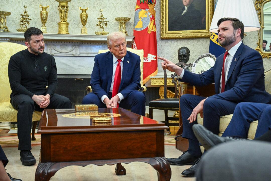 President Donald Trump and Ukrainian President Volodymyr Zelenskyy listen to Vice President JD Vance (R) as they meet in the Oval Office on Feb. 28, 2025. (Saul Loeb/AFP via Getty Images)