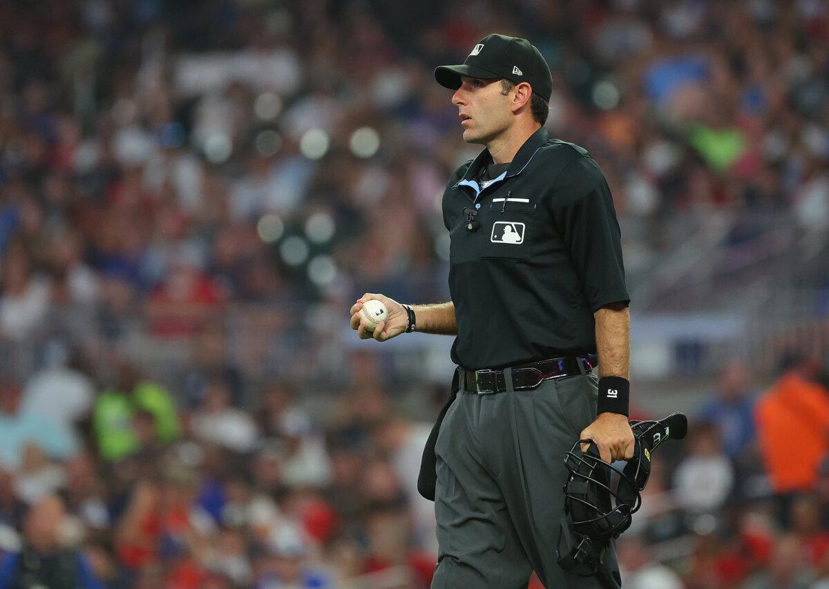 Homeplate umpire Pat Hoberg pauses the game in the sixth inning between the Atlanta Braves and the Arizona Diamondbacks at Truist Park in Atlanta, Georgia, on July 18, 2023. (Kevin C. Cox/Getty Images)
