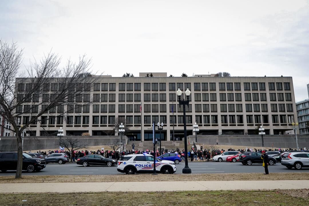 Workers and supporters protest against the Department of Government Efficiency in front of the U.S. Department of Labor in Washington on Feb. 5, 2025. (Al Drago/Getty Images)