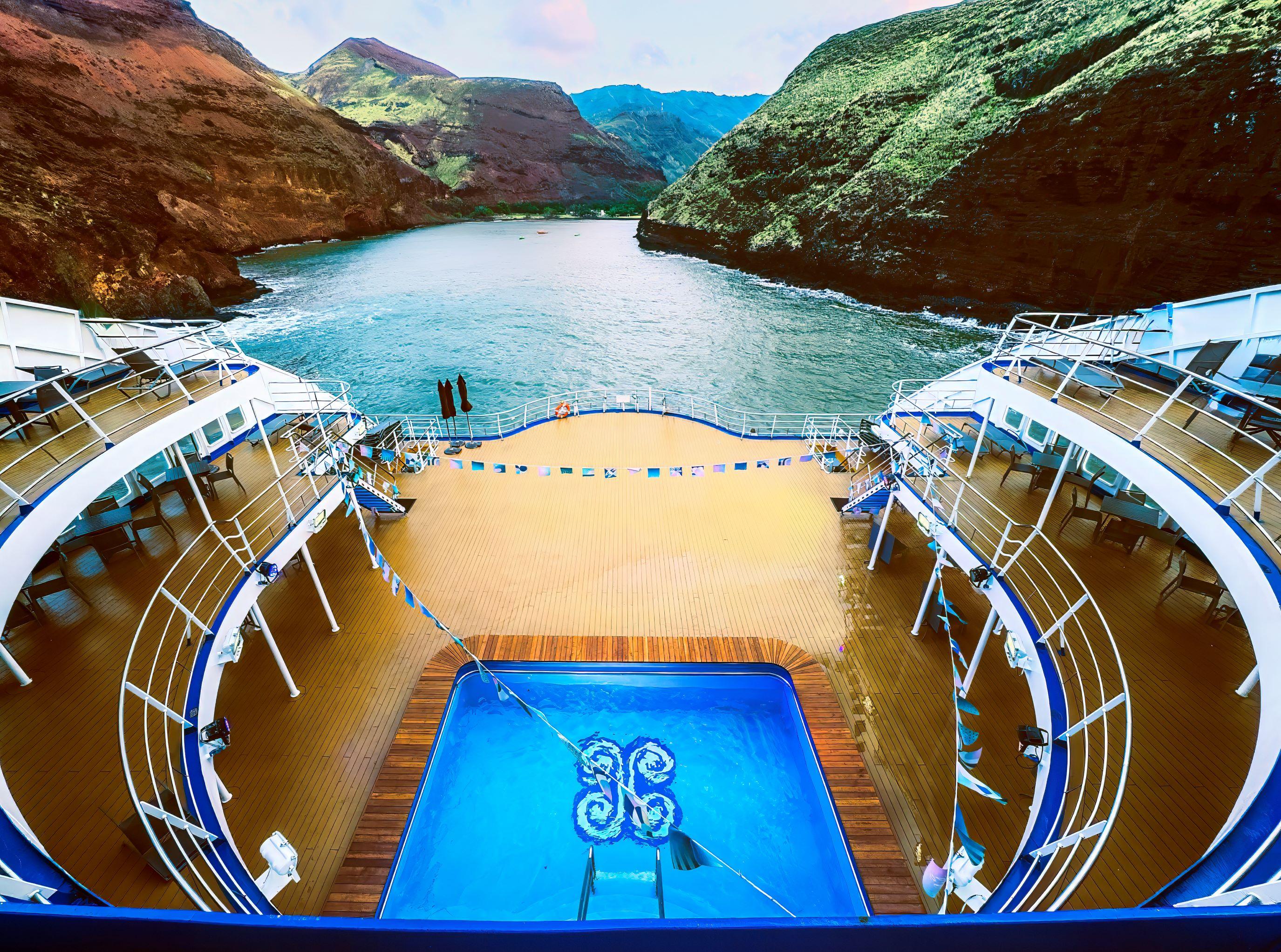 Capt. Arnaud Demesy maneuvers the Aranui 5 in a 180-degree rotation in the narrow channel to the “Invisible Bay” of Vaipaee, Ua Huka. (Maria Coulson)