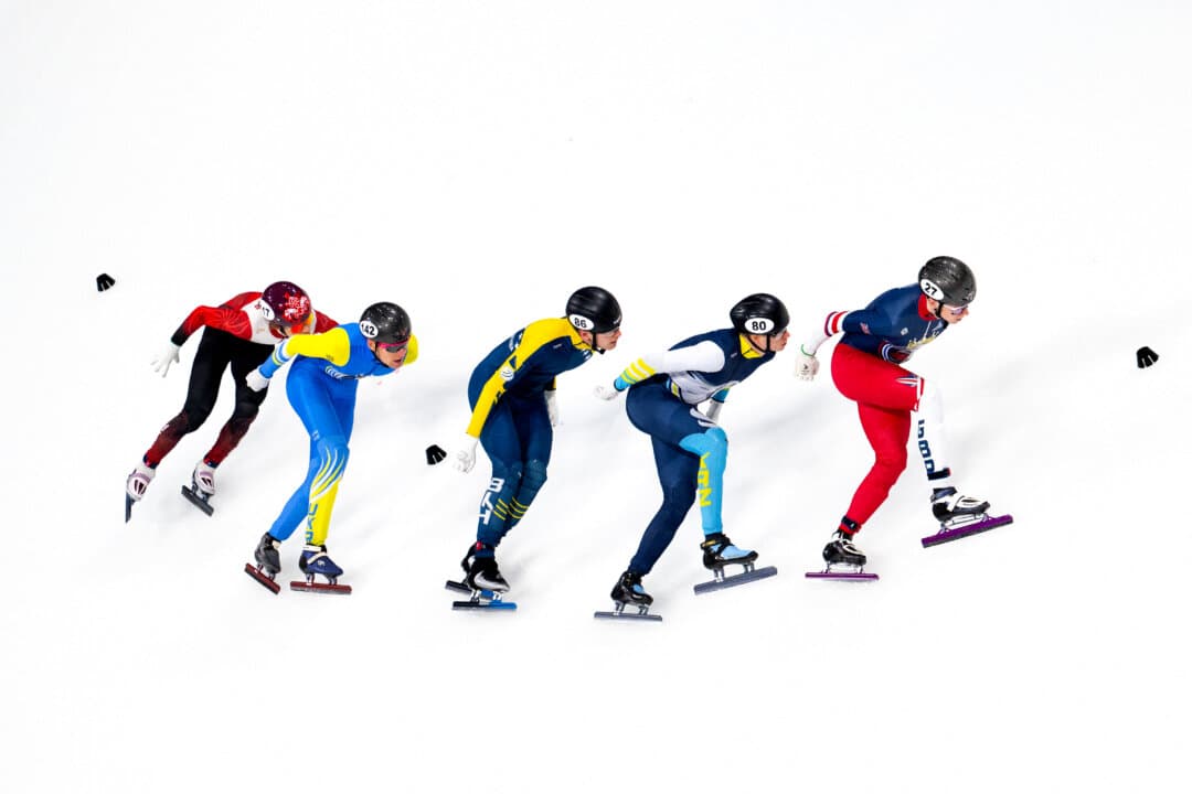 From right: Britain's Niall Treacy, Kazakhstan's Gleb Ivchenko, Bosnia Herzegovina's Tarik Omeragic, Ukraine's Daniil Bergin, and Hong Kong's Tsz Fung Kwok compete in the Men's 1,500m quarterfinals during the 2024/2025 ISU Short Track Speed Skating World Cup Milan 2025, part of a Milano Cortina 2026 Winter Olympic Games test event, at the Milano Speed Skating Stadium in Milan, Italy, on Feb. 15, 2025. (Marco Bertorello/AFP via Getty Images)