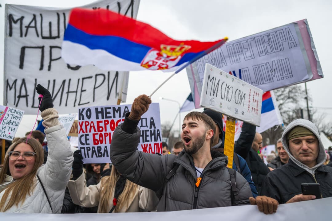 Students and citizens attend a demonstration as they block the main boulevard in central Serbian city of Kragujevac on Feb. 15, 2025, continuing months-long calls for government accountability and reforms. The demonstration is the latest in a series of mass protests to rock the Balkan country after the collapse of a roof at a train station killed 15 people in the northern Serbian city of Novi Sad. The university student-led movement has put increasing pressure on the government of the Balkan country, spurring the resignation of several high-ranking officials. (Andrej Isakovic/AFP via Getty Images)