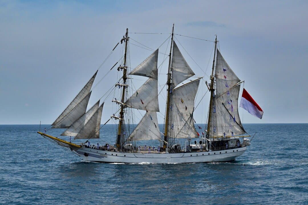 Personnel onboard the Indonesian Navy ship Dewaruci salute during the opening ceremony of the 5th Multilateral Naval Exercise Komodo 2025 off the coast of Indonesia's resort island of Bali on Feb. 16, 2025. (Sonny Tumbelaka/AFP via Getty Images)