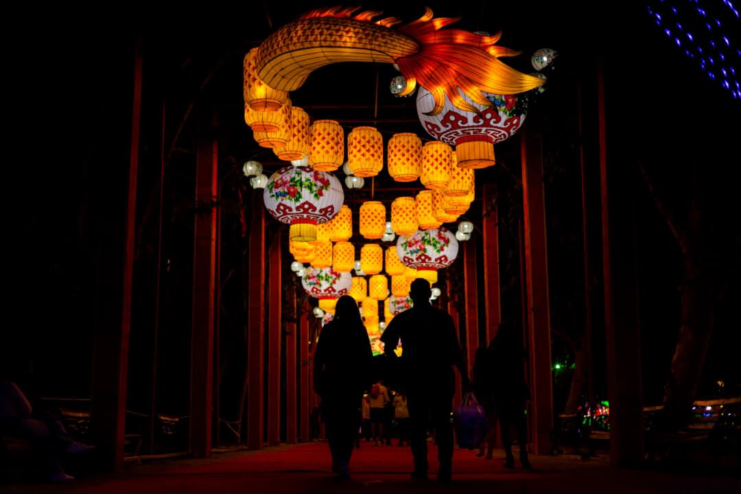 People walk along the dragon's walkway during the Chinese Lantern Festival in Santiago, Chile, on Feb. 16, 2025. (Javier Torres/AFP via Getty Images)