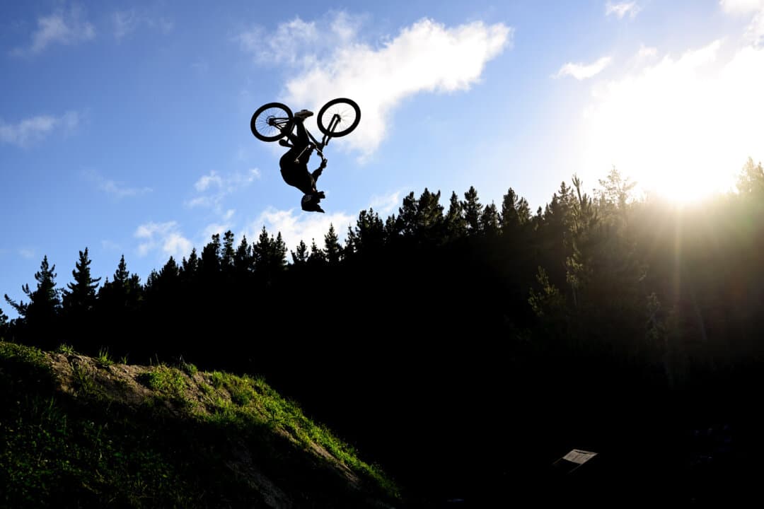 An athlete makes a jump during slopestyle training during Crankworx in Christchurch, New Zealand, on Feb. 15, 2025. (Hannah Peters/Getty Images)