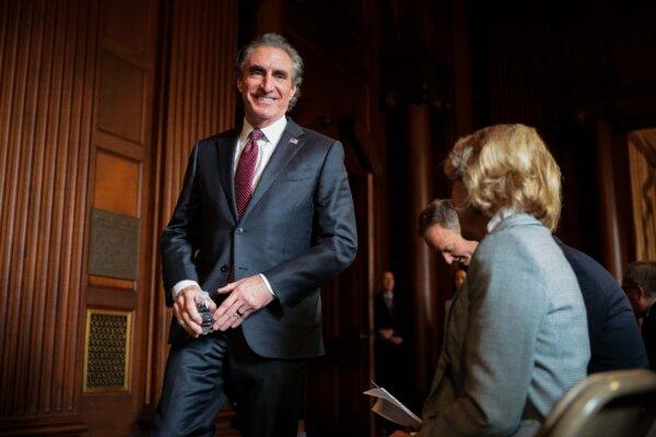 Interior Secretary Doug Burgum takes his seat before a water policy announcement at the Environmental Protection Agency on Feb. 18, 2025, in Washington. (Kayla Bartkowski/Getty Images)
