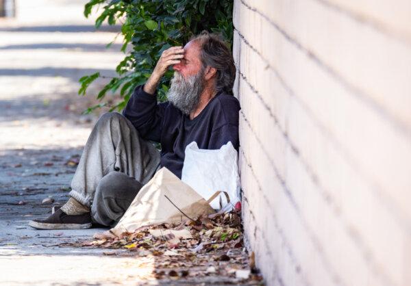 A homeless individual in Santa Ana, Calif., on July 15, 2024. (John Fredricks/The Epoch Times)