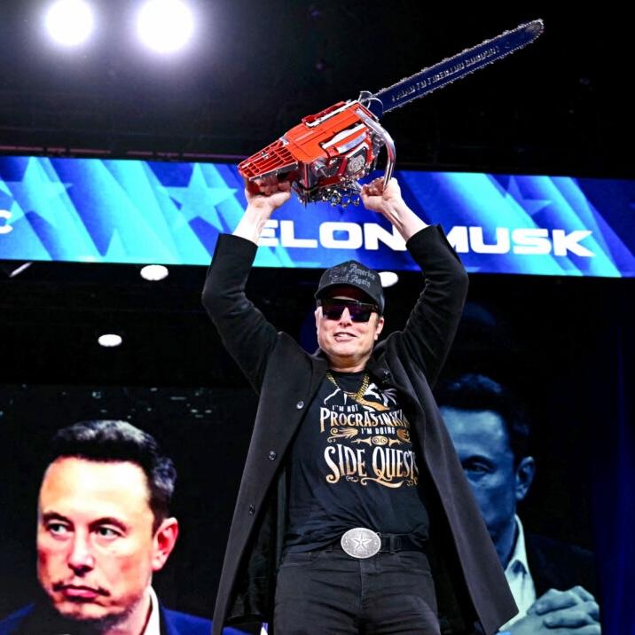 Elon Musk holds a chainsaw during the annual Conservative Political Action Conference (CPAC) at the Gaylord National Resort & Convention Center at National Harbor in Oxon Hill, Maryland, on Feb. 20, 2025. (Saul Loeb/AFP)