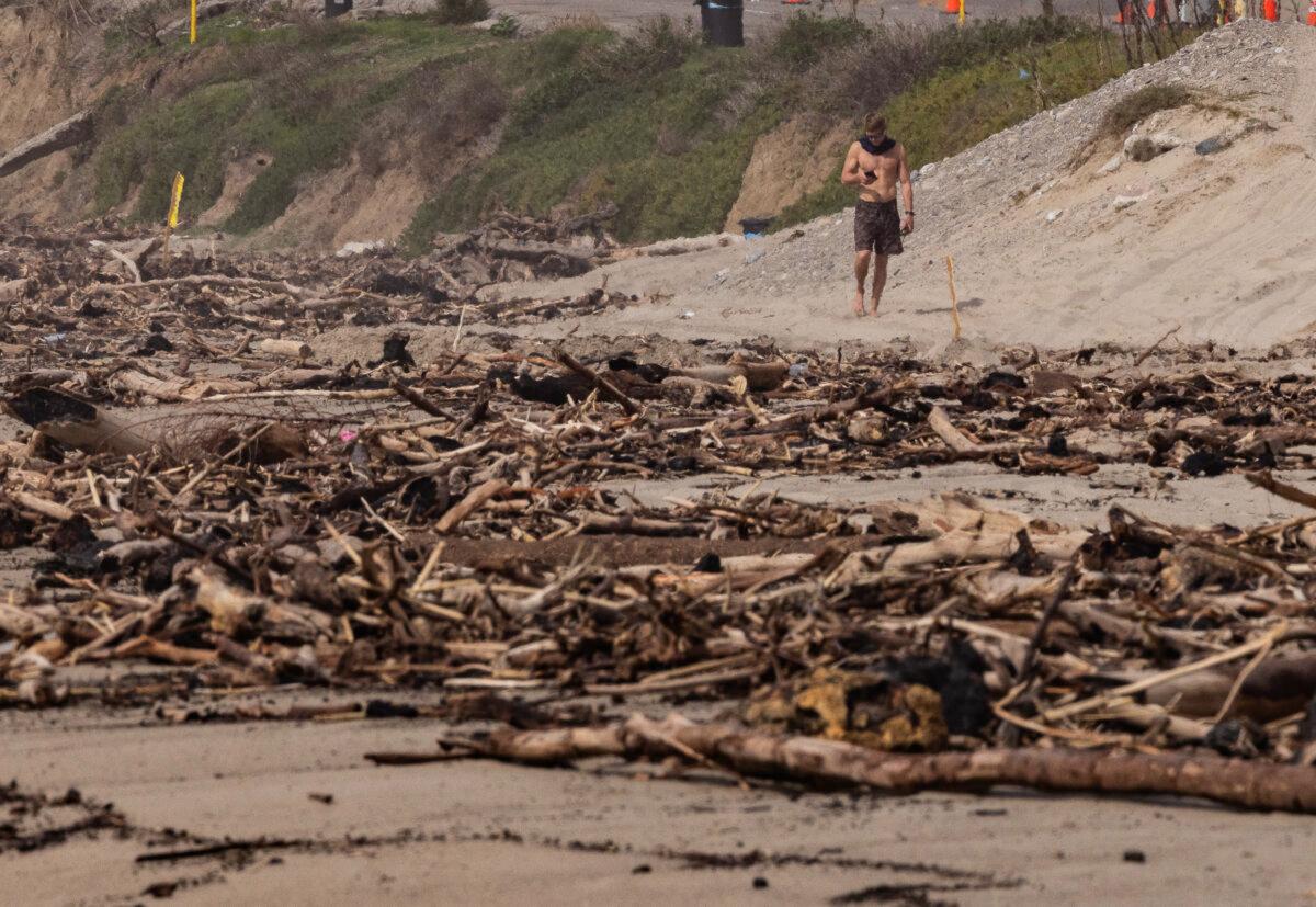Debris leftover from the Palisades fire and heavy rains caused beach closures near Los Angeles, on Feb. 27, 2025. (John Fredricks/The Epoch Times)