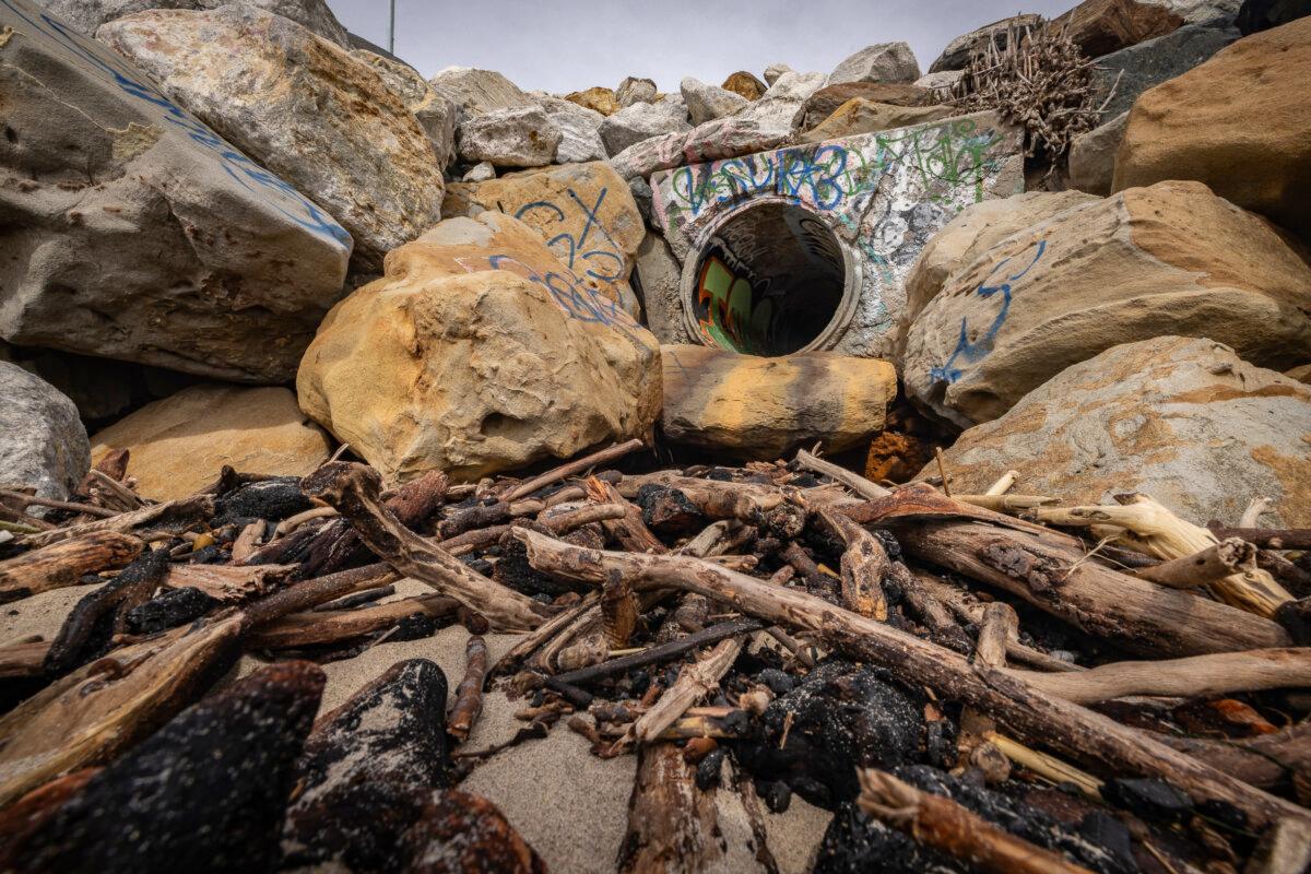 Debris leftover from the Palisades fire and heavy rains caused beach closures near Los Angeles, on Feb. 27, 2025. (John Fredricks/The Epoch Times)