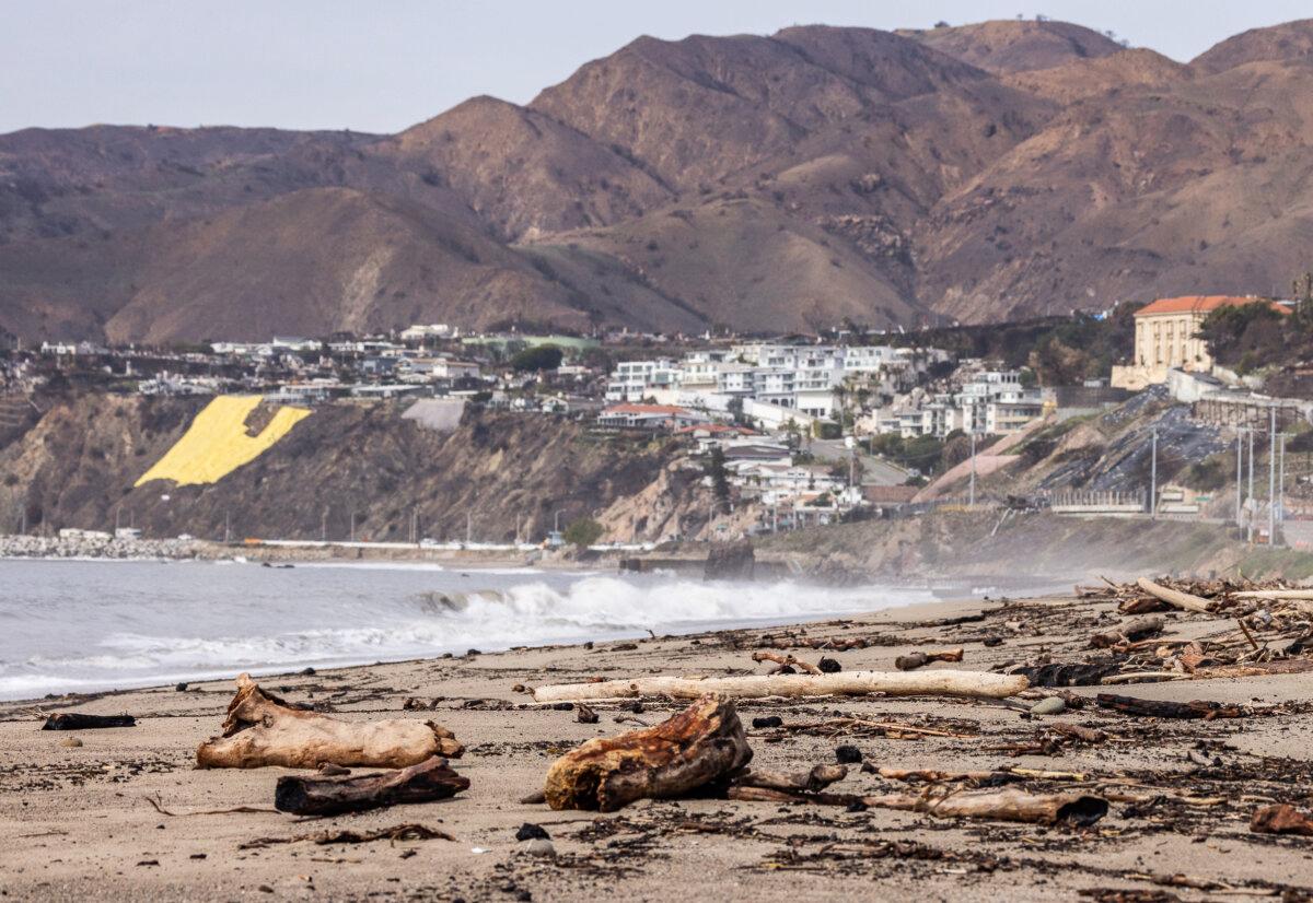 Debris leftover from the Palisades fire and heavy rains caused beach closures near Los Angeles, on Feb. 27, 2025. (John Fredricks/The Epoch Times)