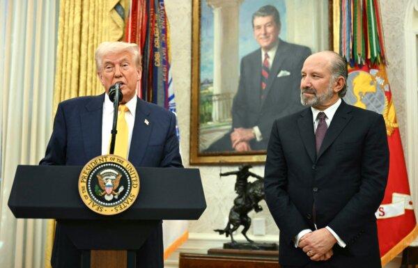 President Donald Trump speaks during a ceremonial swearing-in for Secretary of Commerce Howard Lutnick in the Oval Office on Feb. 21, 2025. (Jim Watson/AFP via Getty Images)