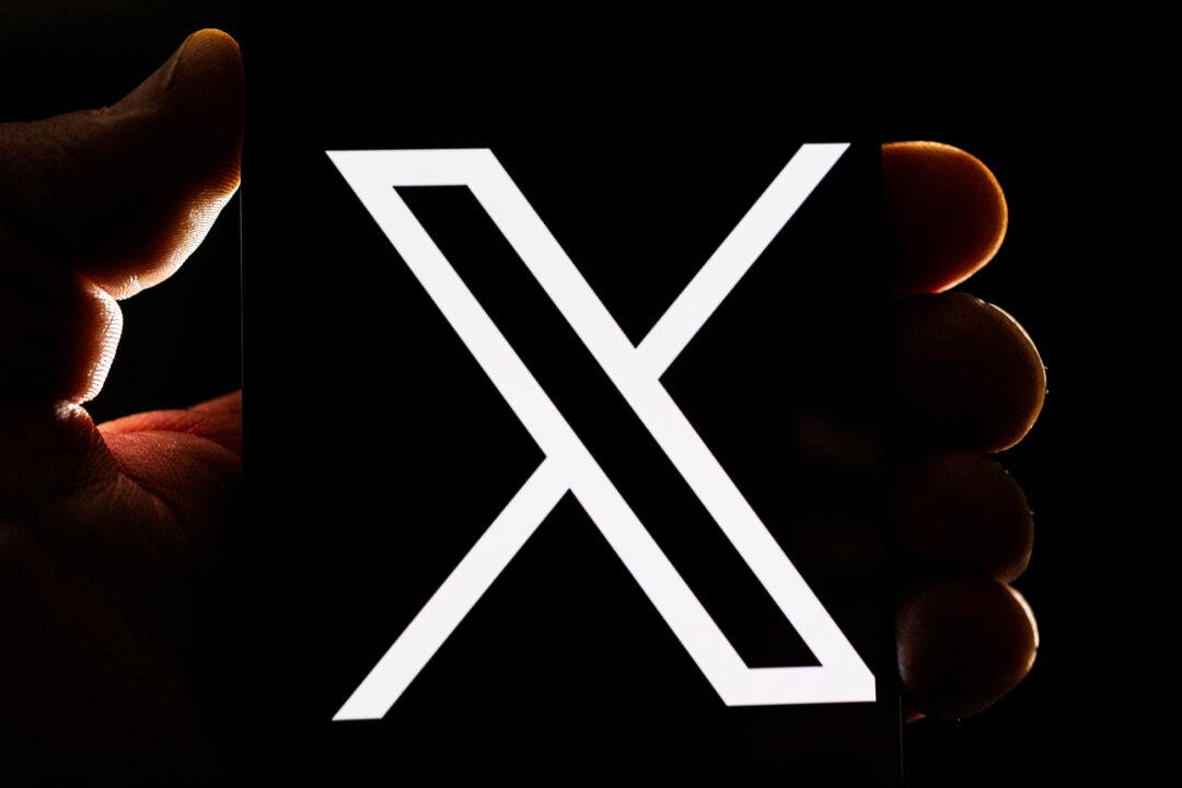 The X logo on a display in London on July 24, 2023. (Dan Kitwood/Getty Images)