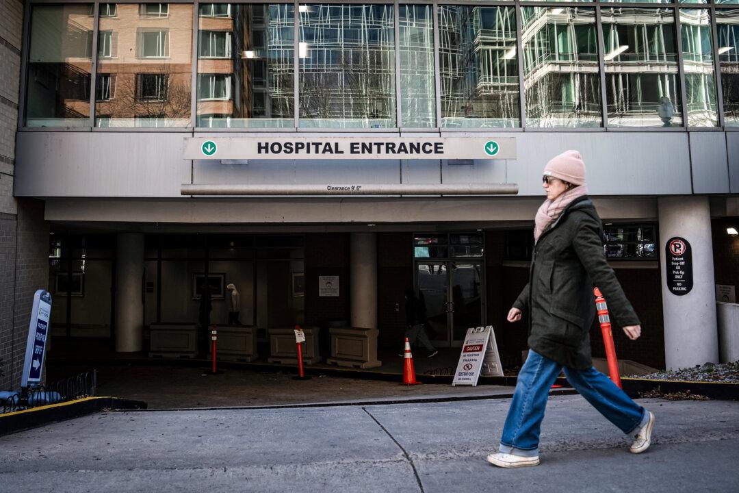 People walk by a hospital in Washington on Jan. 2, 2025. (Madalina Vasiliu/The Epoch Times)
