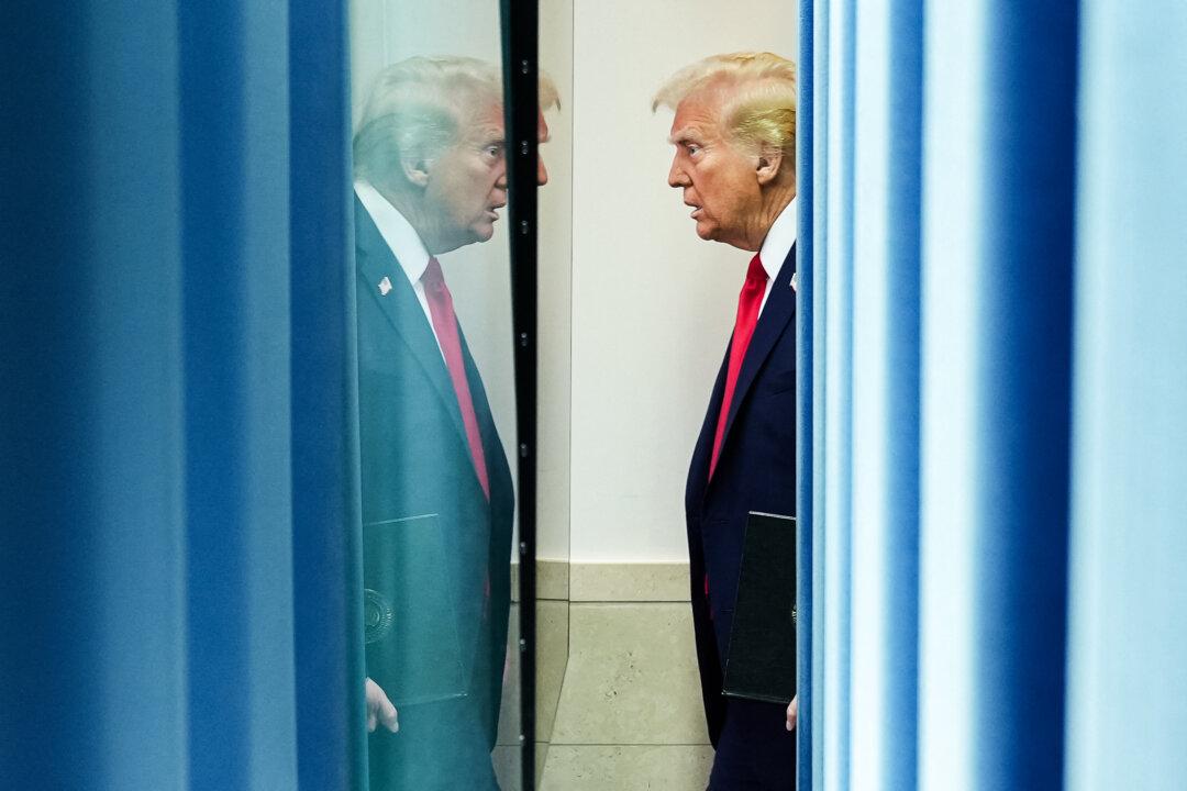 President Donald Trump arrives to speak about the mid-air crash between American Airlines flight 5342 and a military helicopter in Washington, at the White House on Jan. 30, 2025. (Oliver Contreras/AFP via Getty Images)