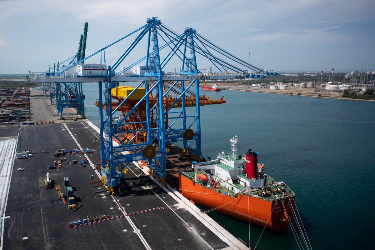 Two giant Malaccamax gantry cranes delivered by the Chinese company Shanghai Zhenhua Heavy Industries at the Fos-Sur-Mer harbor, on the outskirts of Marseille, France, on July 23, 2020. (Clement Mahoudeau/AFP via Getty Images)
