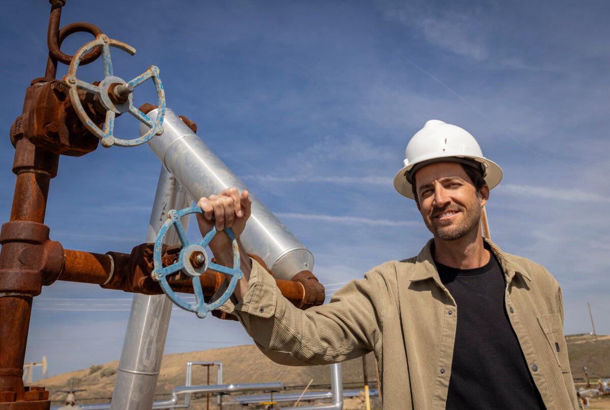 Mike Umbro stands near oil valves in Bakersfield, Calif., on March 21, 2025. (John Fredricks/The Epoch Times)