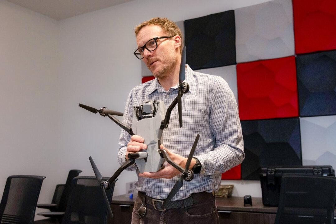 Teal Senior Director of Product Line Management Jim Cory displays one of the company's drones in Salt Lake City on Feb. 21, 2025. (John Fredricks/The Epoch Times)