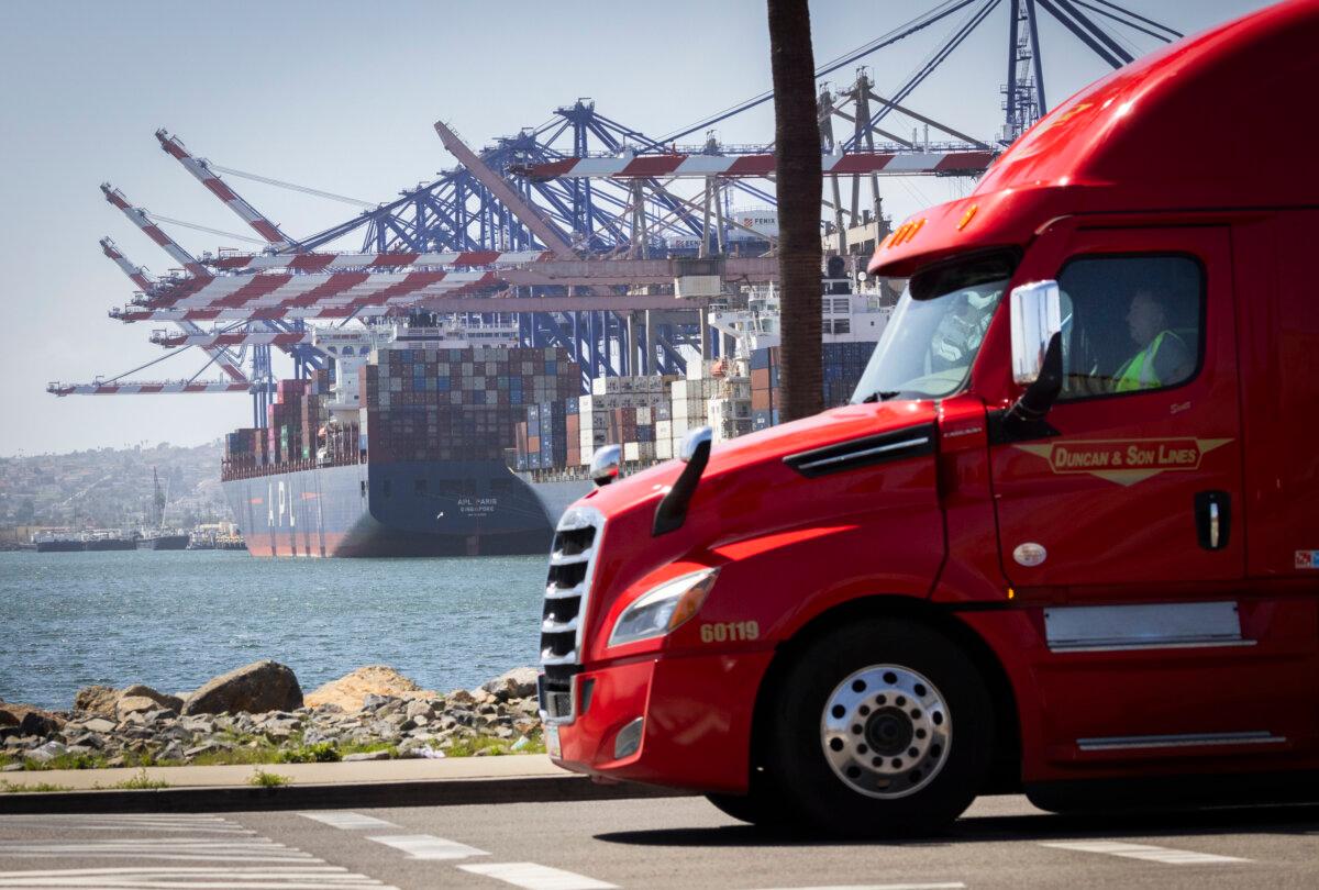 Truckers prepare to pick up shipping containers from the Port of Long Beach, Calif., on March 28, 2025. (John Fredricks/The Epoch Times)