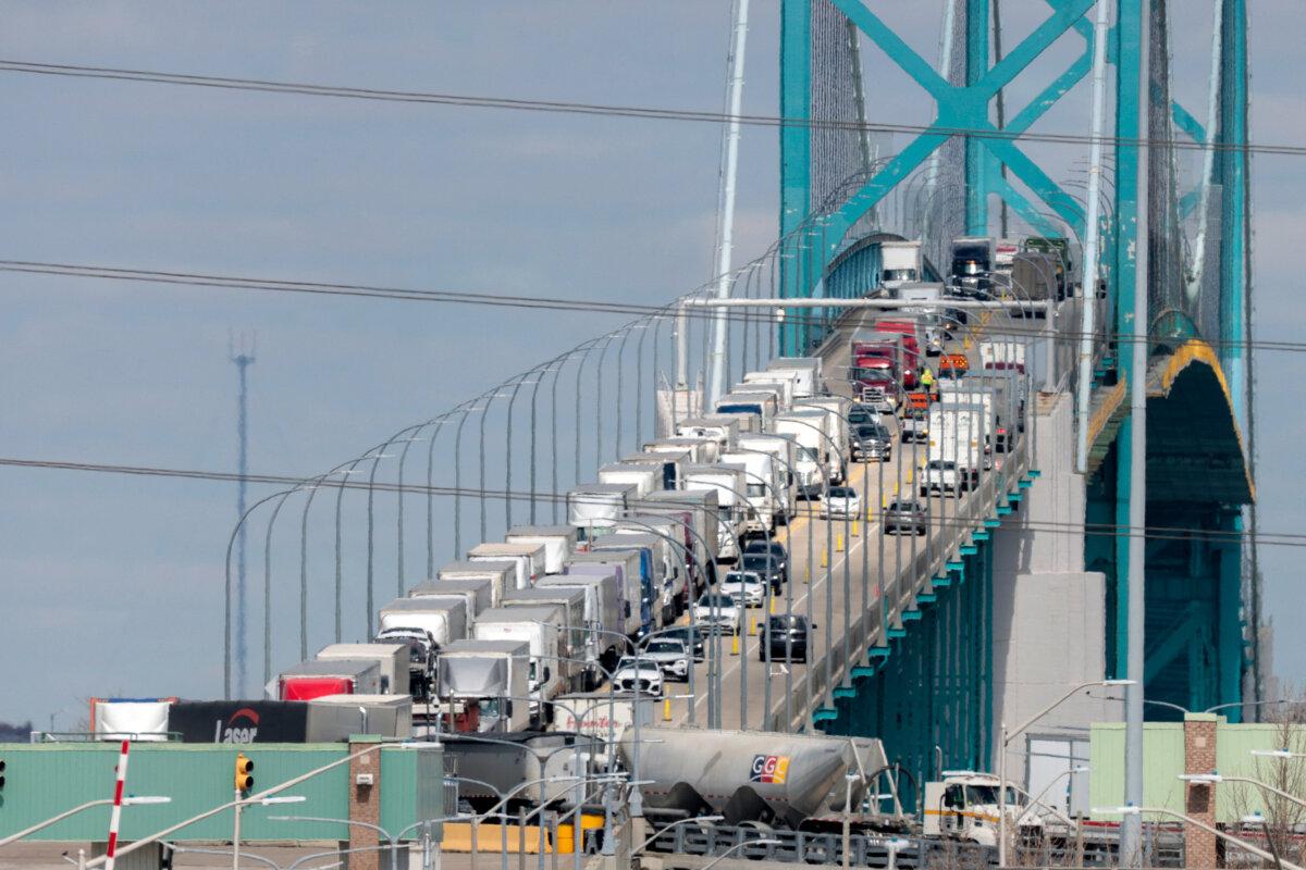 Vehicles cross the Ambassador Bridge in Windsor, Ont., to go to Detroit, Mich., on April 1, 2025. (Jeff Kowalsky/AFP via Getty Images)