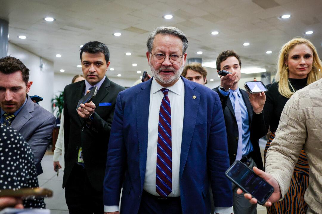 (Left) Sen. Bill Cassidy (R-La.) speaks to reporters following the weekly Republican Senate policy luncheon at the U.S. Capitol on March 11, 2025. (Right) Sen. Gary Peters (D-Mich.) talks to reporters at the U.S. Capitol on Jan. 13, 2025. Cassidy and Peters reintroduced the Genomic Data Protection Act, which would allow Americans using at-home consumer DNA tests to delete their genomic data and request the destruction of their biological samples. (Kayla Bartkowski/Getty Images)