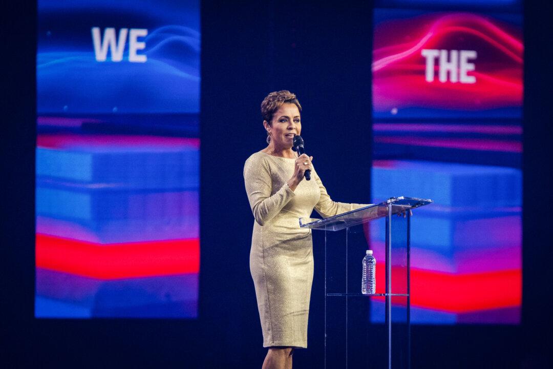 Kari Lake speaks at AmericaFest, hosted by Turning Point USA, in Phoenix on Dec. 21, 2024. (John Fredricks/The Epoch Times)