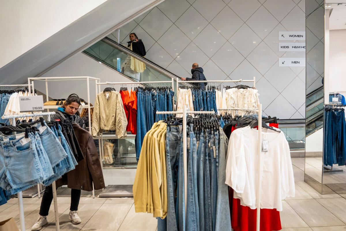 People shop at a retail store in New York City on March 21, 2025. (Samira Bouaou/The Epoch Times)